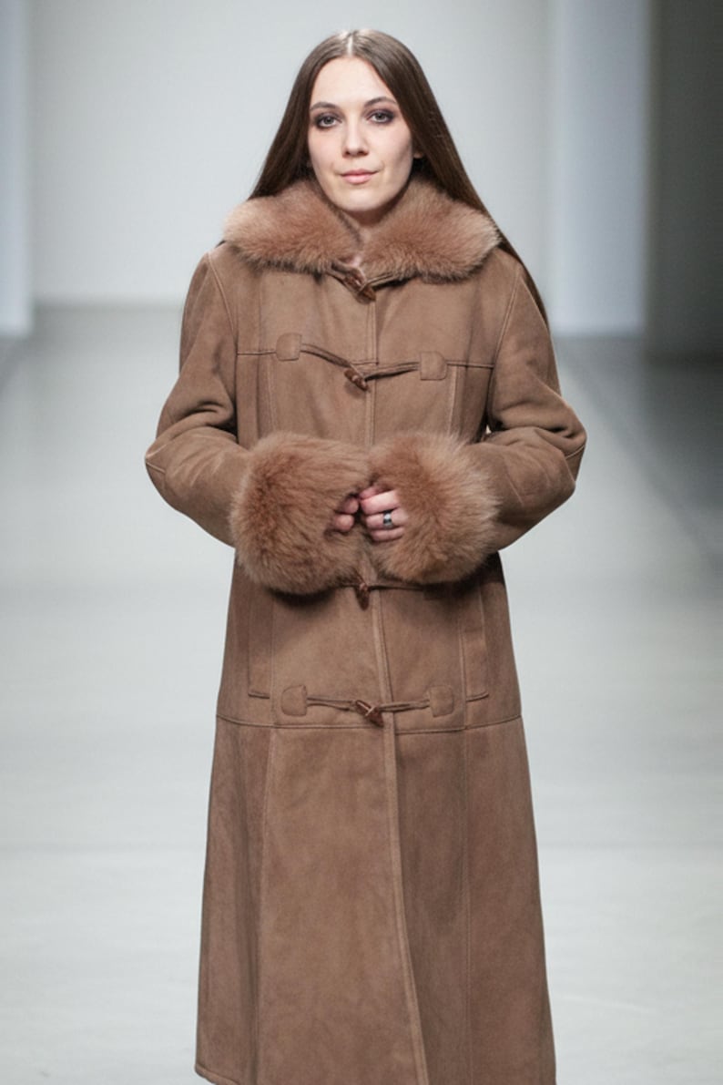 vintage brown sheepskin coat with shearling fur collar and hems