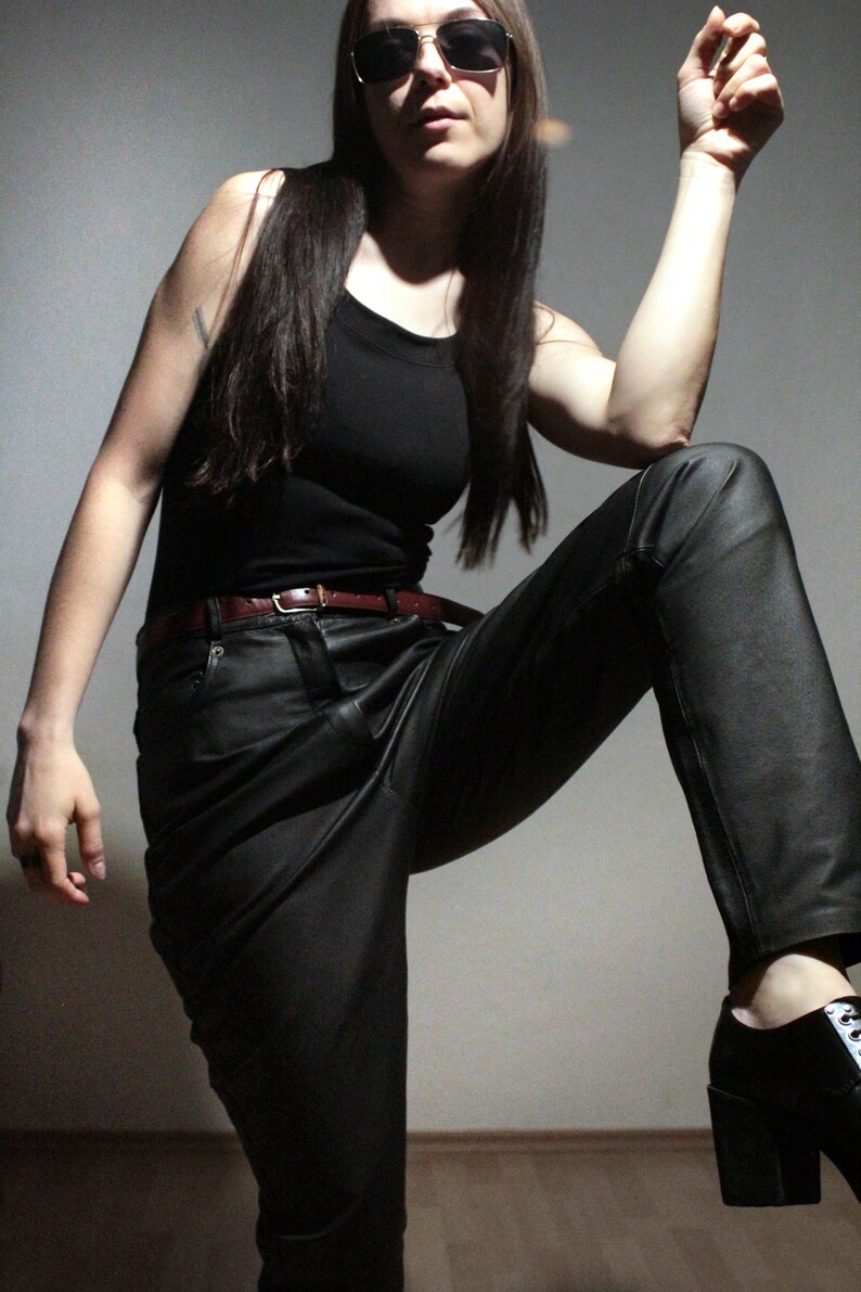 all black leather outfit with tapered leather pants