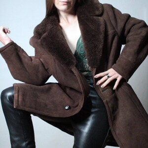 mens brown sheepskin coat with large collar and beige shearling interior