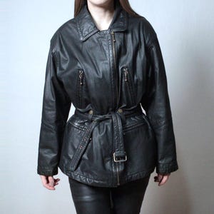Vintage black leather jacket with a belt