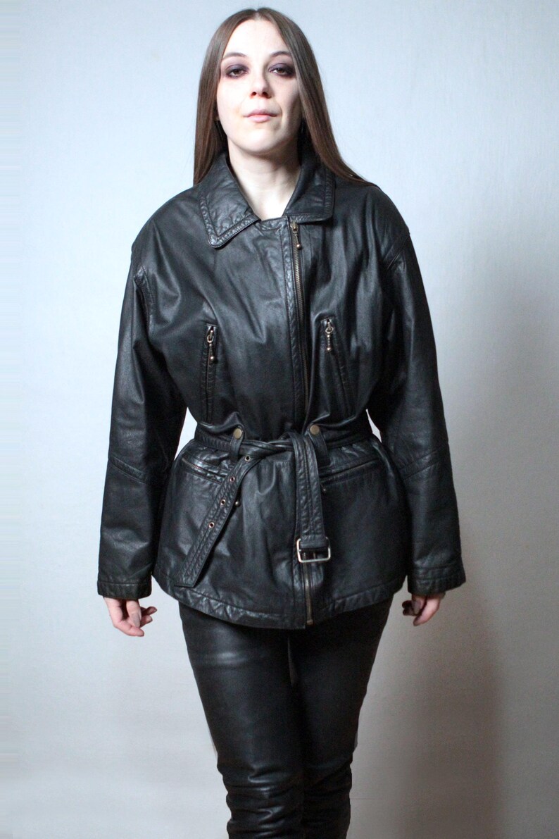 Vintage black leather jacket with a belt