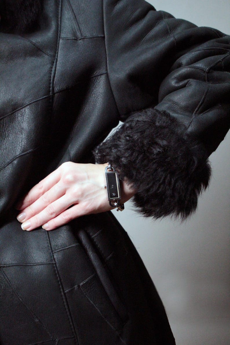 black patchwork sheepskin coat with black fur shearling