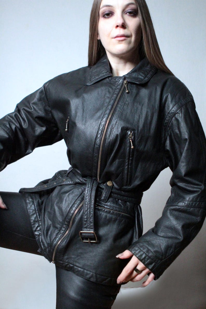 Vintage black leather jacket with a belt
