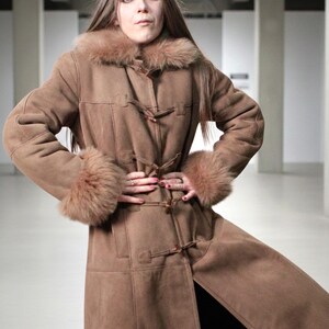 vintage brown sheepskin coat with shearling fur collar and hems
