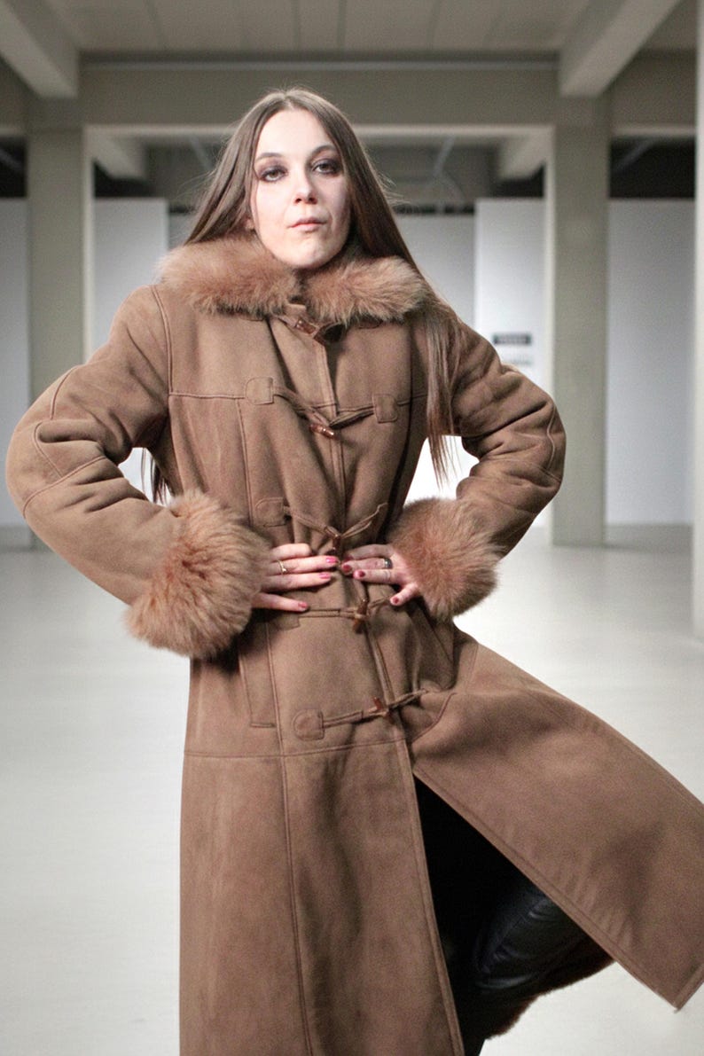 vintage brown sheepskin coat with shearling fur collar and hems