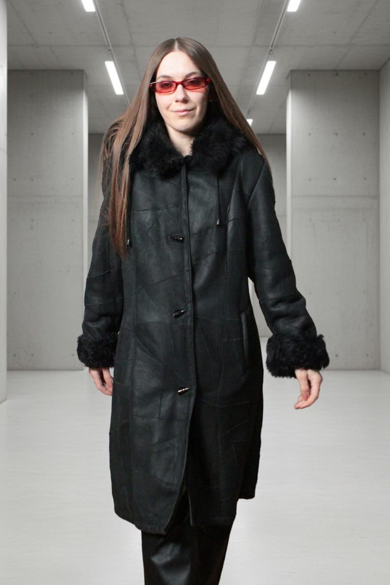 Hooded black shearling sheepskin coat with fur interior