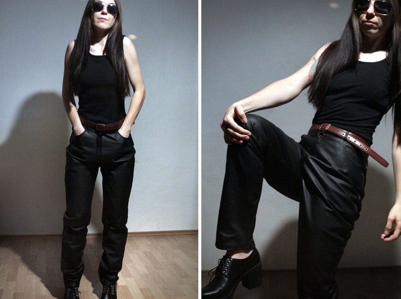 model wearing all black outfit with black leather pants and black cotton tee shirt