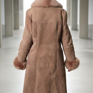 vintage brown sheepskin coat with shearling fur collar and hems