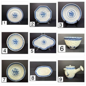 May include: Collection of nine pieces of white porcelain tableware with blue floral designs. Includes plates, bowls, and a teapot. Some pieces have openwork or scalloped edges. The designs are centered and repeated around the rims.