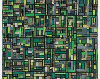 May include: A patchwork quilt in shades of green, from dark forest to light lime. The design is made up of rectangular and square blocks, creating a geometric pattern. The quilt is a handmade item, perfect for adding a touch of colour and warmth to a home.