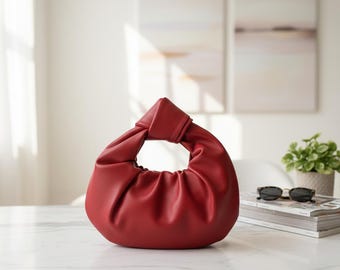 Bolso de mano con nudo de piel • Mini bolso de mano con asa superior fruncida • Bolso de noche minimalista