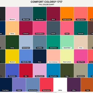 May include: A Comfort Colors 1717 full color chart displaying a grid of numerous square color swatches. Each square features a distinct solid color with its corresponding name printed in black or white text centered within the individual block.