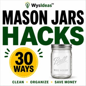 May include: A clear glass Ball wide-mouth mason jar with a silver lid. The image includes text that reads "MASON JARS HACKS" and "30 WAYS" in a yellow circle. Additional text at the bottom says "CLEAN, ORGANIZE, SAVE MONEY."