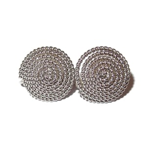 Orecchini a clip in argento a spirale intrecciata
