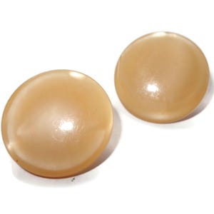 Vintage vintage klemoorbellen met beige knopen