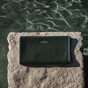Complete hotel branding kit with modern logo, color palette, and typography guide.