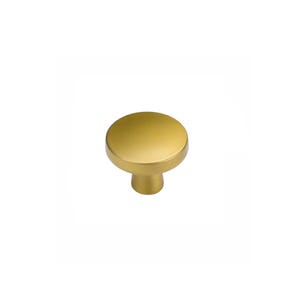 May include: A gold-coloured cabinet knob with a rounded top and a short, cylindrical base. The knob has a matte finish and is designed for use on drawers or cabinet doors. The hardware is a simple, modern design.