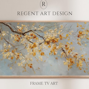 May include: A rectangular framed digital artwork titled REGENT ART DESIGN FRAME TV ART, featuring an oil painting style depiction of tree branches with textured golden-yellow leaves against a soft, muted light blue and grey background.