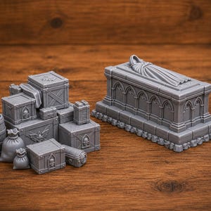 May include: A grey miniature fantasy terrain set, including a sarcophagus with a draped figure and various crates, barrels, and sacks. The crates have cross-bracing and decorative details. Ideal for tabletop gaming, the set is made of plastic.