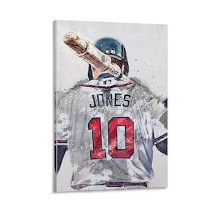 May include: Watercolor-style print of a baseball player wearing a gray jersey with the name "JONES" and the number "10" in red. The player is wearing a helmet and holding a bat.