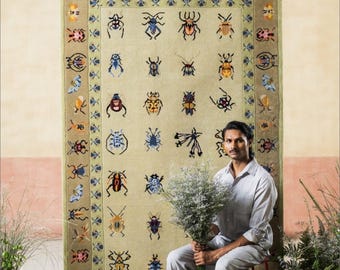 Handcrafted Insect Motif Rug – Artistic Folk Pattern Carpet in Soft Yellow & Multicolor Accents