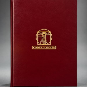May include: A deep red hardcover book featuring a gold foil embossed Vitruvian Man illustration centered on the front cover. Below the illustration, the text CODEX HAMMER is printed in a gold rectangular frame, maintaining a clean, professional look.