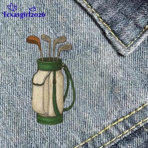 May include: A set of three ceramic mugs with a speckled, matte finish. The mugs are in shades of cream, light gray, and dark gray. Each mug has a simple, minimalist design and a rounded handle.