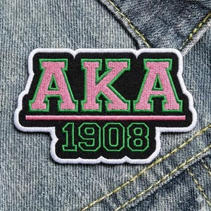 May include: A rustic wooden sign with the text "Welcome to our home" in white lettering. The sign features a distressed finish and a simple, inviting design, perfect for front door decor.