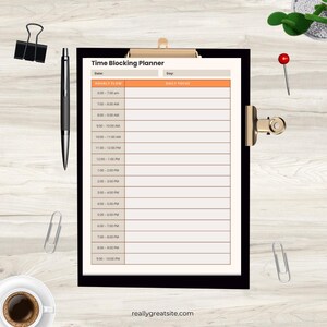 May include: A Time Blocking Planner sheet on a black clipboard with a gold clip. The planner features an orange header, columns for hourly flow from 6:00 am to 10:00 pm, and a daily focus section. The text reallygreatsite.com is printed at the bottom.