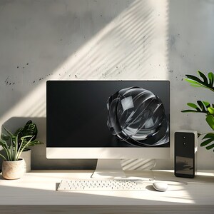 Peut inclure: Un espace de travail moderne avec un ordinateur de bureau affichant un design abstrait en 3D sur son écran noir. Un clavier et une souris blancs sont devant le moniteur. Des plantes en pot et un haut-parleur noir sont sur le bureau.
