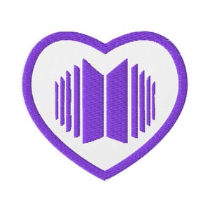 May include: Embroidered patch in the shape of a heart with a white center and a purple border. The center features a purple design of vertical lines and a stylized open book. The patch is likely for clothing or accessories.