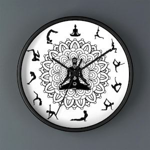 May include: Black and white yoga-themed wall clock. The clock face features a central mandala design with a seated figure and yoga poses around the perimeter. The clock has a black frame and black hands.