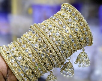 Rhinestones kundan & jhumka bangles set in golden for festive and wedding wear