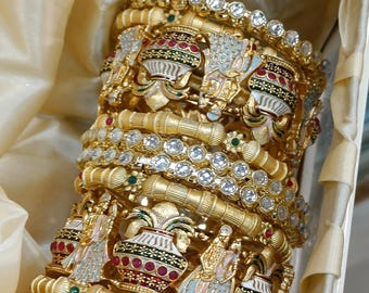 Golden Designer bridal bangles with rhinestones and beads for weddings or festive wear