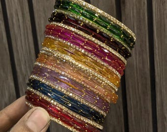 Multicolour raindrop bangles set with rhinestone bangles in golden for wedding and festive wear