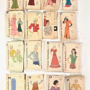 May include: A selection of vintage sewing patterns for women's clothing, including dresses, blouses, and skirts. The patterns display illustrations of garments in diverse styles and colours. The brand name "nene modelle" is printed on the packaging.