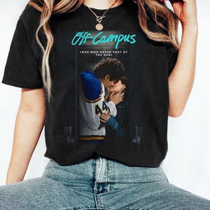 May include: Black t-shirt featuring the teal text "Off-Campus". The graphic below shows two people kissing. The text "Love was never part of the deal" is below the graphic.