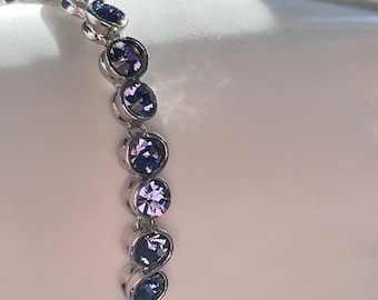 Vintage Tanzanite Coloured Tennis Bracelet on Silver Tone Metal.