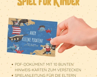 Puede incluir: Una mano sostiene una tarjeta de juego infantil con temática pirata, con el texto "AHOY KLEINE PIRATEN!". El juego incluye un documento PDF con pistas, instrucciones y accesorios opcionales para una búsqueda del tesoro.