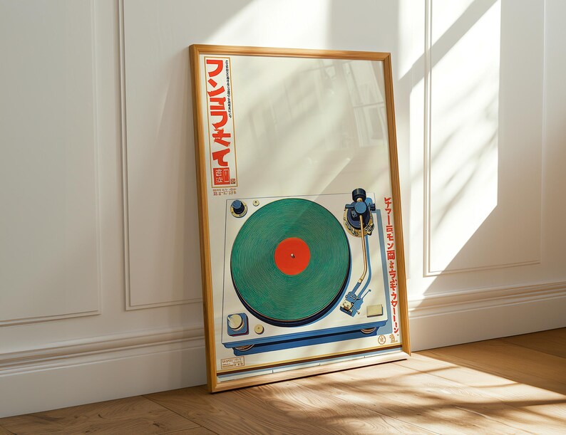 May include: A framed poster featuring a vintage turntable design. The turntable has a green record with a red center, set against a cream background. Japanese text is visible on the frame. The frame is a light brown color.