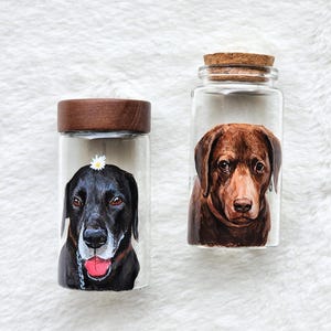 Hand-painted pet memorial jar with realistic portrait on UV-resistant glass, featuring an airtight seal for storing fur or ashes.