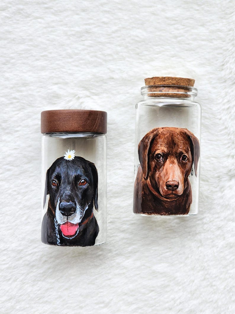 Hand-painted pet memorial jar with realistic portrait on UV-resistant glass, featuring an airtight seal for storing fur or ashes.