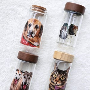 Hand-painted pet memorial jar with realistic portrait on UV-resistant glass, featuring an airtight seal for storing fur or ashes.