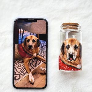 Hand-painted pet memorial jar with realistic portrait on UV-resistant glass, featuring an airtight seal for storing fur or ashes.