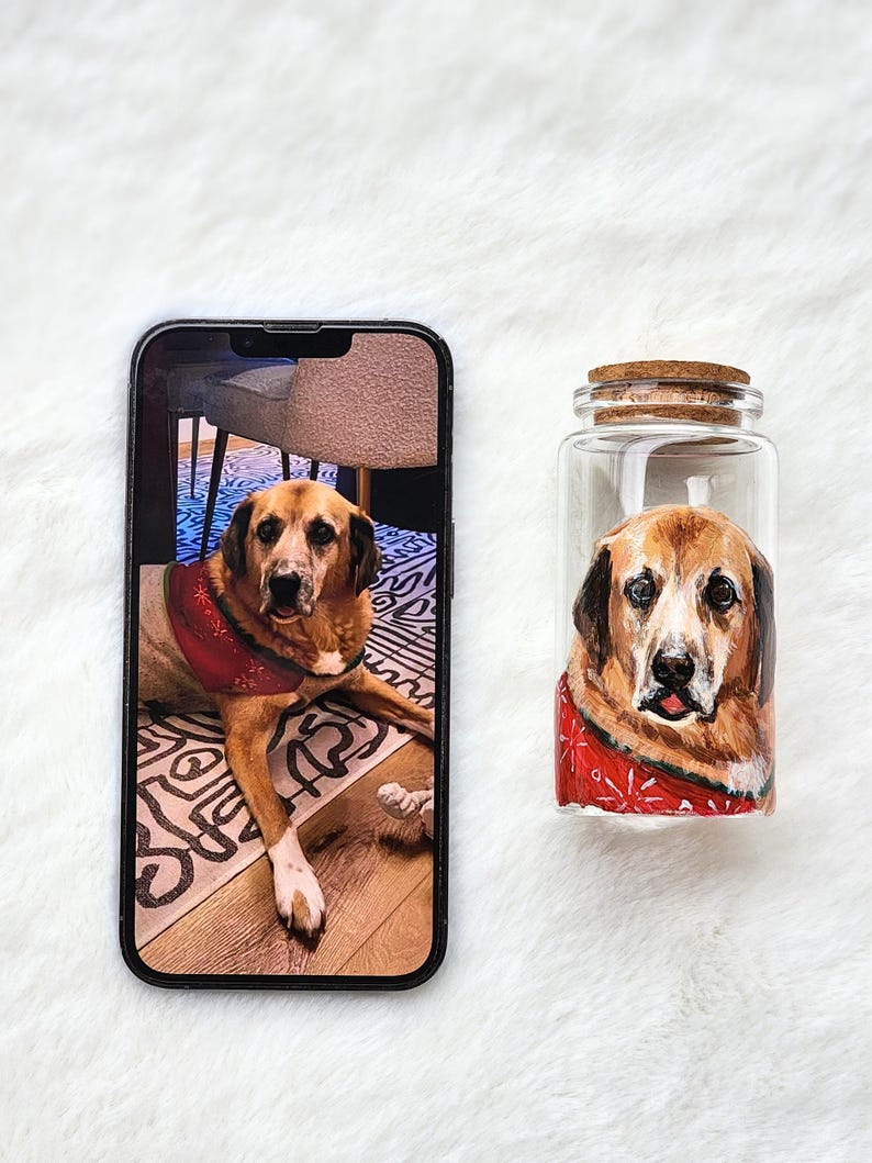 Hand-painted pet memorial jar with realistic portrait on UV-resistant glass, featuring an airtight seal for storing fur or ashes.