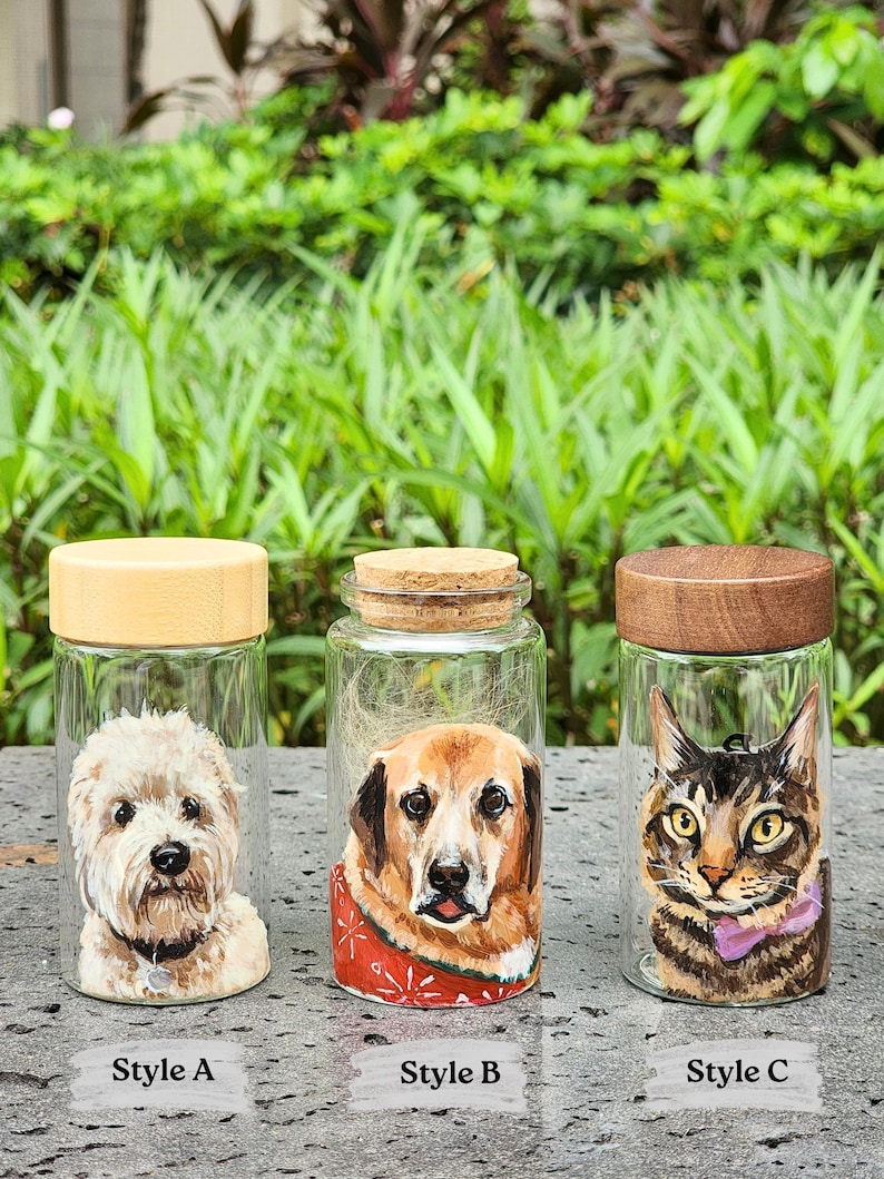Hand-painted pet memorial jar with realistic portrait on UV-resistant glass, featuring an airtight seal for storing fur or ashes.