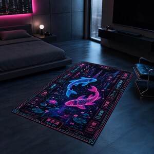 May include: A rectangular area rug featuring a dark background with two glowing koi fish in blue and pink, surrounded by neon-style Japanese text, lotus flowers, and lily pads. The design includes borders with text like Tokyo Bay and Night Market.
