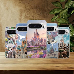 May include: Five phone cases with colorful designs featuring castles and the text "You can dream it, you can do it" and "Kingdom". The cases are on a wooden surface with a leafy green plant in the background.