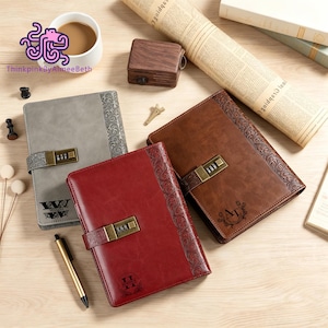 May include: Three rectangular journals in gray, red, and brown, each featuring a vertical embossed floral pattern on the right side and a brass-colored combination lock closure. The covers display custom monogrammed initials and names in black ink.
