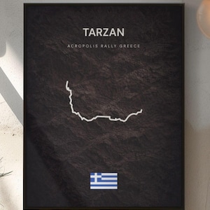 May include: Black framed poster with the word "TARZAN" at the top, and "ACROPOLIS RALLY GREECE" below it. A white line drawing of a road map is in the center, with the Greek flag at the bottom.